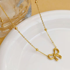 Golden Bow Charm Necklace